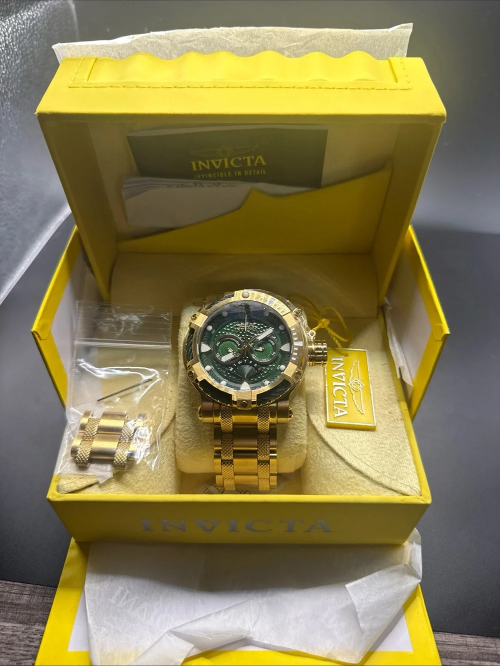 Invicta Men's Bolt model 29832 quartz movement, and gold/green execution